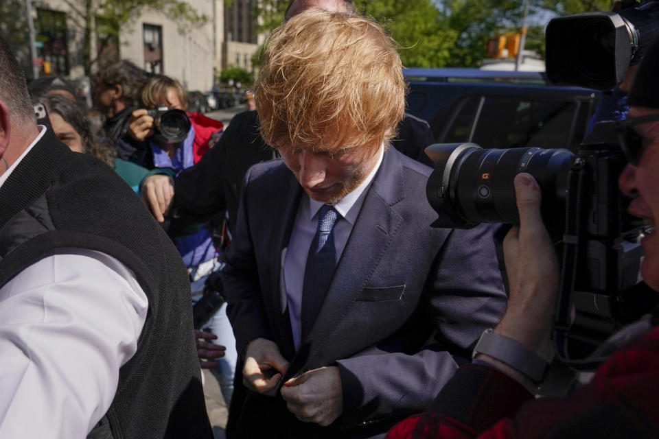 Ed Sheeran walks into Manhattan federal court on Tuesday, April 25, 2023, in New York. The heirs of Ed Townsend, Marvin Gaye's co-writer of the 1973 soul classic, sued Sheeran, alleging the English pop star's hit 2014 tune has “striking similarities” to “Let's Get It On” and “overt common elements” that violate their copyright. (AP Photo/Seth Wenig)