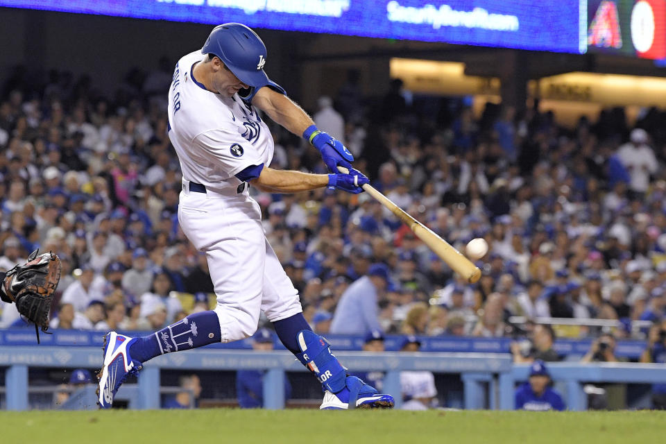 Los Angeles Dodgers' Chris Taylor hits a three-run home run during the fourth inning of a baseball game against the Arizona Diamondbacks Monday, Sept. 19, 2022, in Los Angeles. (AP Photo/Mark J. Terrill)