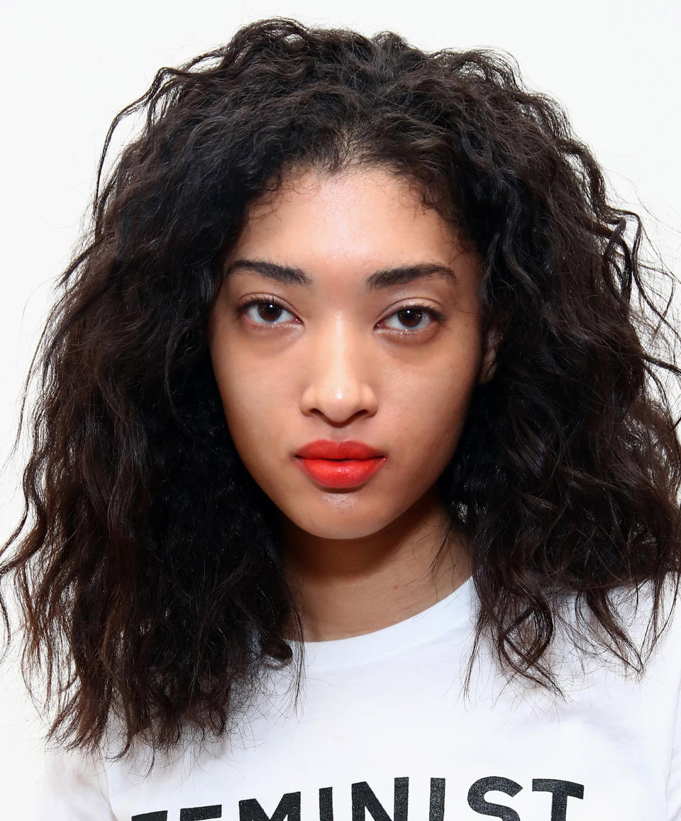 <p>Statement pieces at Public School weren't limited to the politically-charged wardrobe pieces--that bold orange lip is the very definition of a power pout.</p>