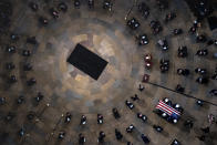 The casket of former Sen. Bob Dole, R-Kan., arrives in the Rotunda of the U.S. Capitol, where he will lie in state, Thursday, Dec. 9, 2021, on Capitol Hill in Washington. (AP Photo/Andrew Harnik, Pool)