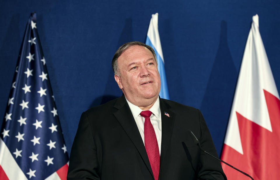 U.S. Secretary of State Mike Pompeo looks on during a press conference with Israeli Prime Minister Benjamin Netanyahu and Bahrain's Foreign Minister Abdullatif bin Rashid Alzayani after their trilateral meeting in Jerusalem on Wednesday, Nov. 18, 2020. (Menahem Kahana/Pool via AP)