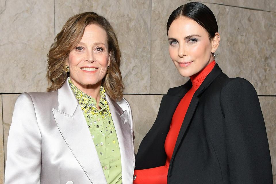 Honoree Sigourney Weaver and Charlize Theron attend ELLE's 29th Annual Women in Hollywood celebration presented by Ralph Lauren, Amyris and Lexus at Getty Center on October 17, 2022 in Los Angeles, California.