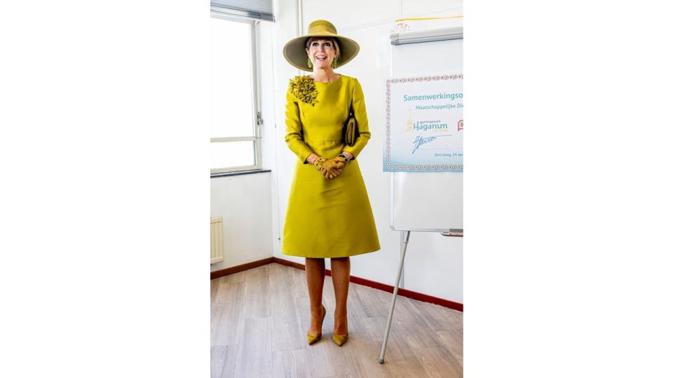 Queen Maxima  in chartreuse hat and dress
