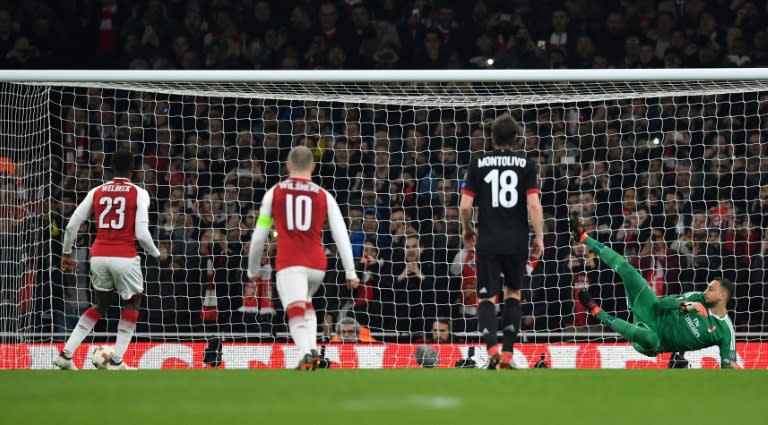 Danny Welbeck scored a controversial penalty to help Arsenal into the Europa League quarter-finals