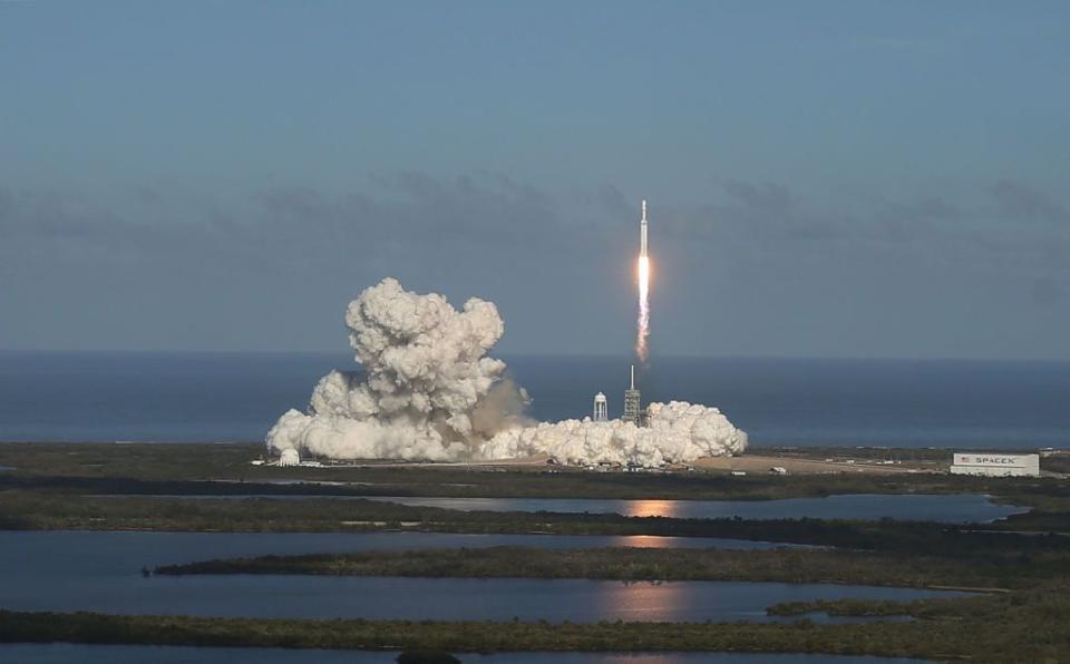 The SpaceX Falcon Heavy rocket lifts off from launch pad 39A at Kennedy Space Center on February 6, 2018 in Cape Canaveral, Florida.  (Photo by Joe Raedle/Getty Images)