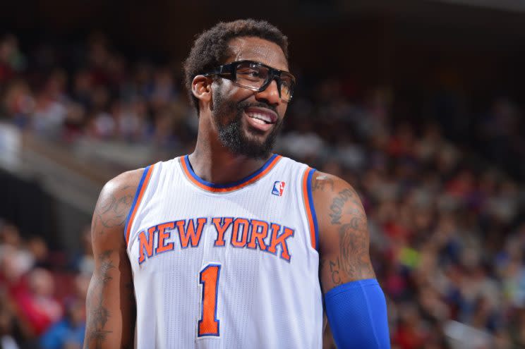 ïPHILADELPHIA, PA - JANUARY 11: Amar'e Stoudemire #1 of the New York Knicks smiling during a game against the Philadelphia 76ers at the Wells Fargo Center on January 11, 2014 in Philadelphia, Pennsylvania. NOTE TO USER: User expressly acknowledges and agrees that, by downloading and or using this photograph, User is consenting to the terms and conditions of the Getty Images License Agreement. Mandatory Copyright Notice: Copyright 2013 NBAE (Photo by Jesse D. Garrabrant/NBAE via Getty Images)