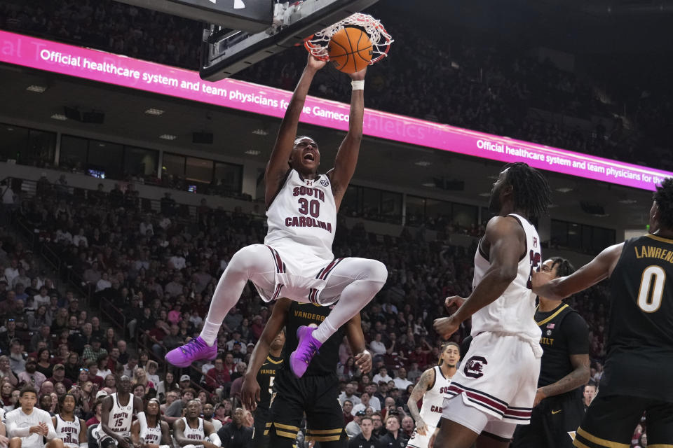 South Carolina forward Collin Murray-Boyles (30) dunks the ball during the second half of an NCAA college basketball game against Vanderbilt, Saturday, Feb. 10, 2024, in Columbia, S.C. (AP Photo/David Yeazell)