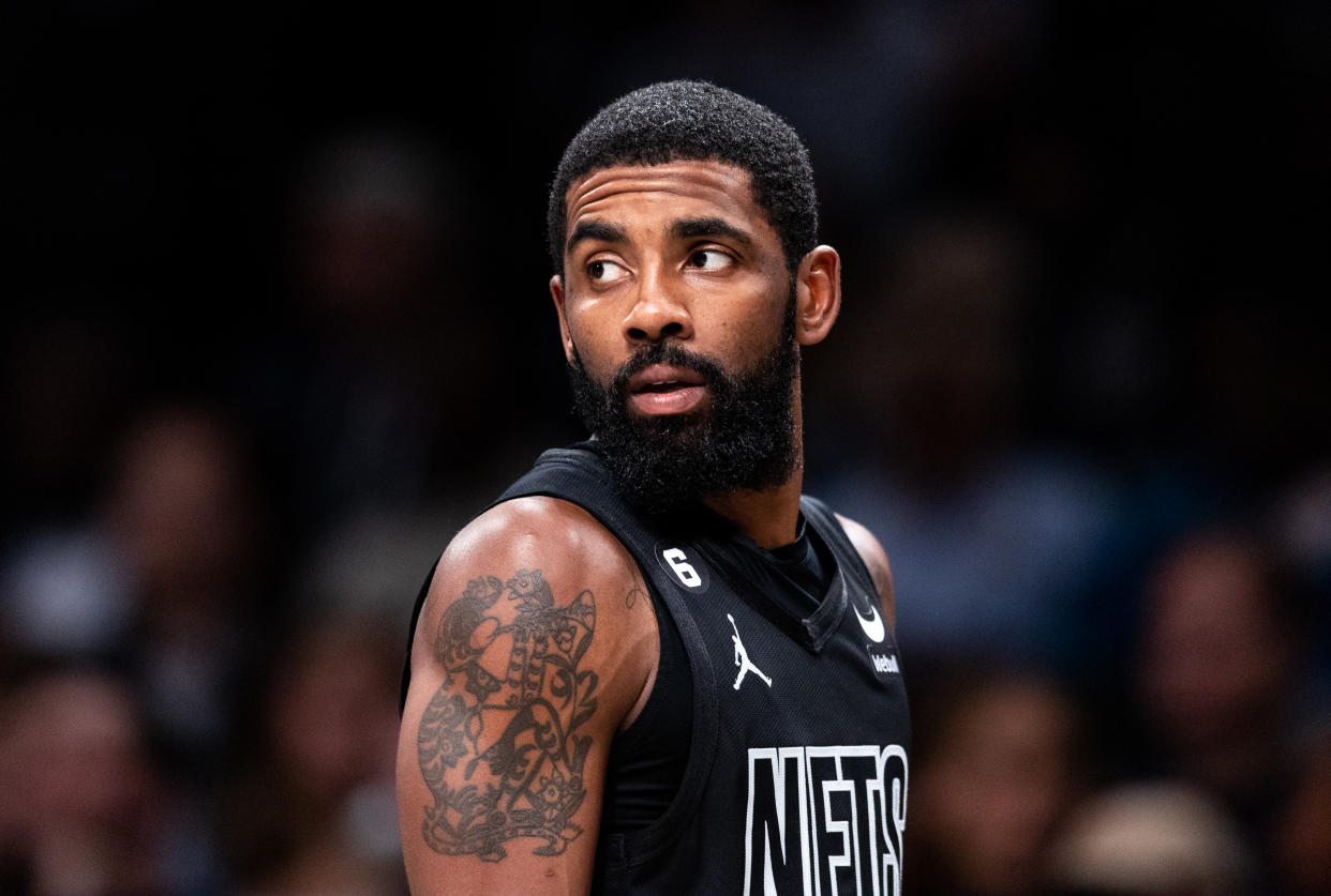 NEW YORK, NEW YORK - OCTOBER 31: Kyrie Irving #11 of the Brooklyn Nets looks on during a break in the action during the first quarter of the game against the Indiana Pacers at Barclays Center on October 31, 2022 in New York City. NOTE TO USER: User expressly acknowledges and agrees that, by downloading and or using this photograph, User is consenting to the terms and conditions of the Getty Images License Agreement. (Photo by Dustin Satloff/Getty Images)