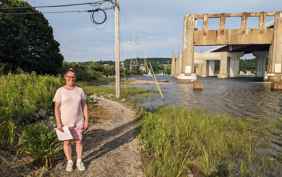 Nicole Gotovich, acting chair of the Common Fence Point Preparedness Committee, poses on the path to Narragansett Boulevard Beach adjacent to Railroad Ave in Portsmouth, RI on Thursday, June 13 2023.