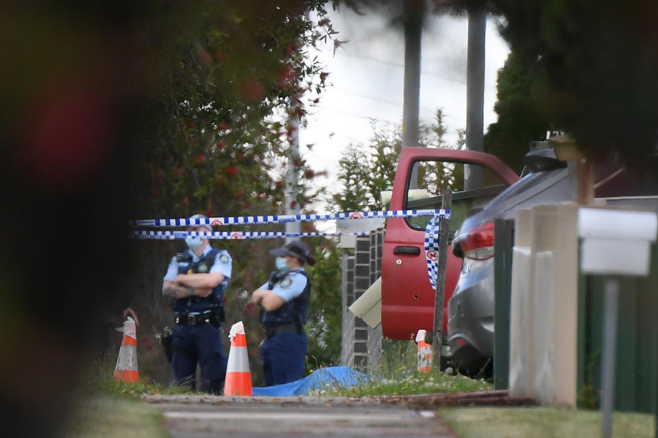 Police work at the scene of a fatal shooting in Guildford, Sydney, Wednesday. Source: AAP Image/Dan Himbrechts