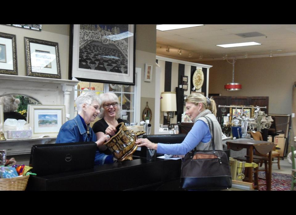 The inventory is constantly changing at Rebound. Here, Jeanne and Faye admire a piece a customer has picked up.