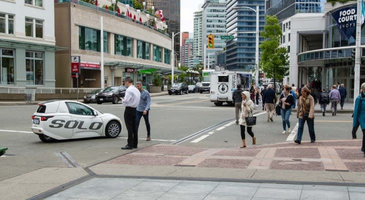 The Solo vehicle from Electra Meccanica Vehicles (SOLO) drives through Vancouver