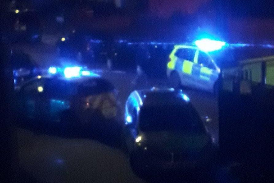 Police at the estate late on Monday evening (Trudi Brown (Twitter))