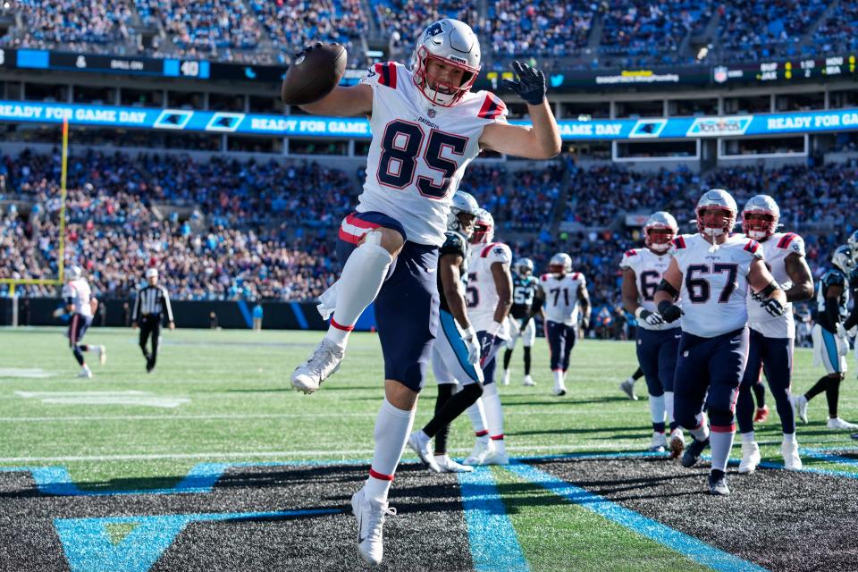 New England Patriots tight end Hunter Henry (85) celebrates his touchdown against the Carolina Panthers on Nov. 7, 2021, at Bank of America Stadium in Charlotte, North Carolina.