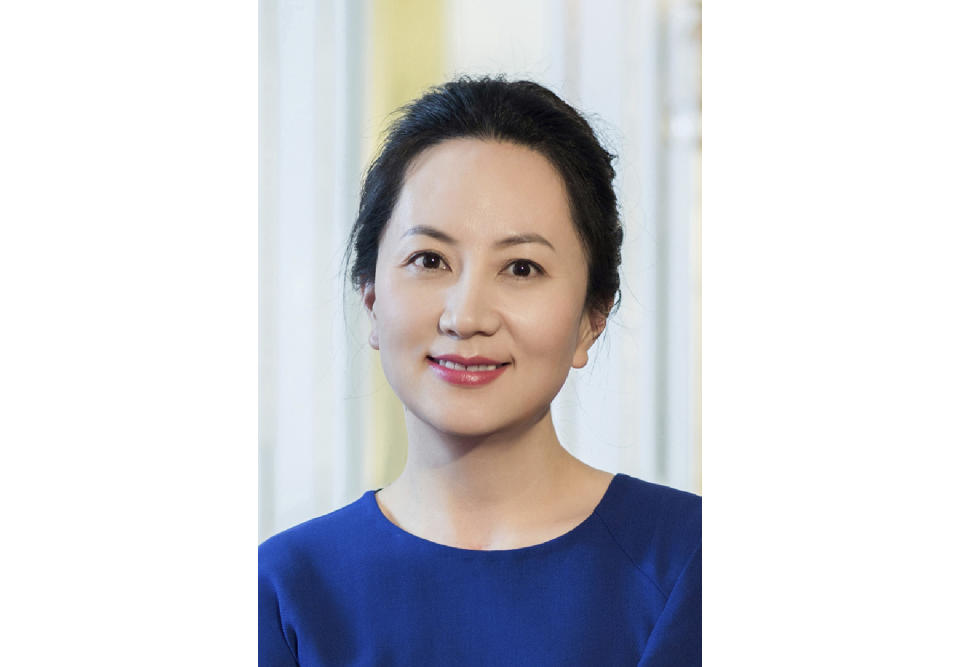 In this undated photo released by Huawei, Huawei's chief financial officer Meng Wanzhou is seen in a portrait photo. China on Thursday, Dec. 6, 2018, demanded Canada release the Huawei Technologies executive who was arrested in a case that adds to technology tensions with Washington and threatens to complicate trade talks. (Huawei via AP)