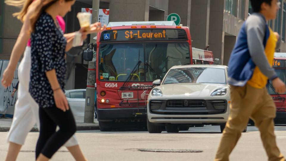 A Route 7 OC Transpo bus drives in downtown Ottawa on June 29, 2023.