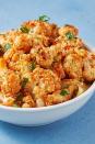 <p>When we're looking for a spicy, flavourful side to brighten up our dinner, we turn to Bang Bang Cauliflower. Not only is it quick and easy, but the dish is super adaptable.</p><p>Get the <a href="https://www.delish.com/uk/cooking/recipes/a28852702/bang-bang-cauliflower-recipe/" rel="nofollow noopener" target="_blank" data-ylk="slk:Bang Bang Cauliflower;elm:context_link;itc:0;sec:content-canvas" class="link ">Bang Bang Cauliflower</a> recipe.</p>