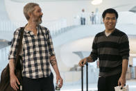 American's Andy Huynh, right, and Alex Drueke, left, chat as they arrive at the TWA Hotel on Friday, Sept. 23, 2022 in New York. The two U.S. military veterans who disappeared three months ago while fighting Russia with Ukrainian forces were among 10 prisoners, including five British nationals, released this week by Russian-backed separatists as part of a prisoner exchange mediated by Saudi Arabia. (AP Photo/Andres Kudacki)