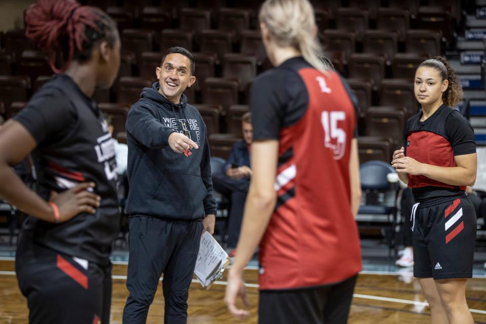 U of L assistant coach, Sam Purcell, second from left, talks with players during a walk through before the #6 ranked U of L basketball team took on the #22 ranked Arizona Wildcats at The Mammoth Sports Construction Invitational in Sioux Falls, South Dakota. Nov. 12, 2021