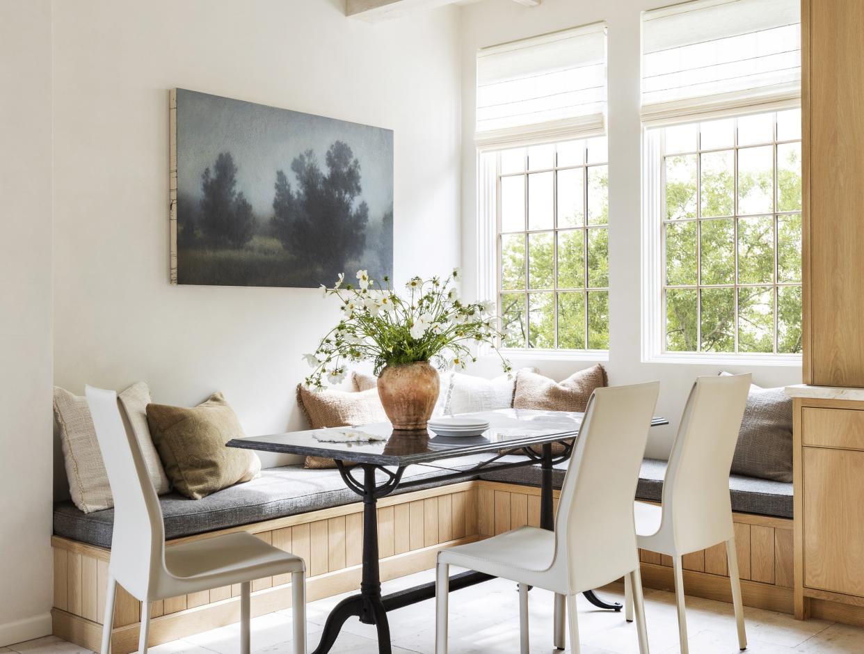  A window treatment with wooden blinds. 