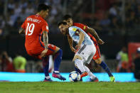 Football Soccer - Argentina v Chile - World Cup 2018 Qualifiers - Antonio Liberti Stadium, Buenos Aires, Argentina - 23/3/17 - Argentina's Lionel Messi (R), Chile's Pablo Hernandez (19) and Charles Aranguiz (rear) compete for the ball. REUTERS/Marcos Brindicci