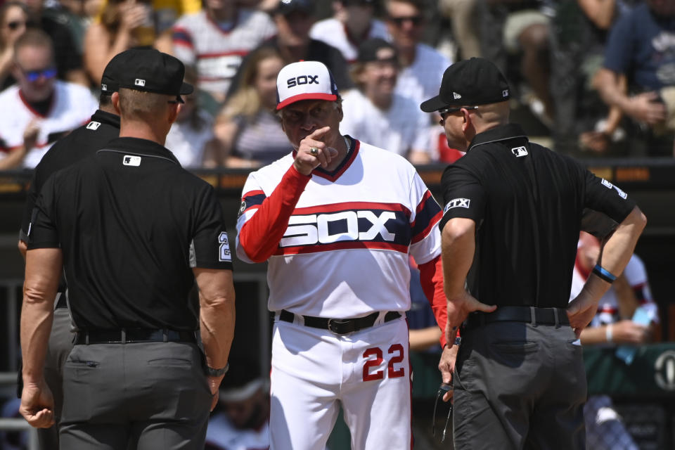 Chicago White Sox manager Tony La Russa (22) talks with umpires after Jose Abreu was hit by a pitch thrown by Cleveland Indians starting pitcher Cal Quantrill during the fifth inning of a baseball game, Sunday, Aug. 1, 2021, in Chicago. (AP Photo/Matt Marton)