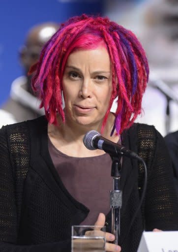 Director Lana Wachowski speaks onstage at the "Cloud Atlas" Press Conference during the 2012 Toronto International Film Festival on September 9. Wachowski this week publicly embraced her gender switch from Larry for the first time -- with bright pink dreads