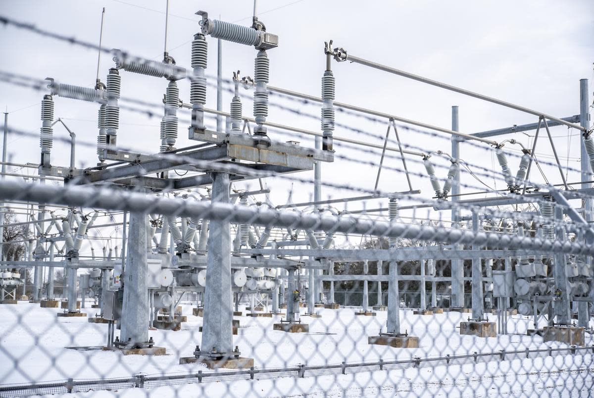 Snow surrounds an Austin Energy station in Austin on Thursday, Feb. 18, 2021.