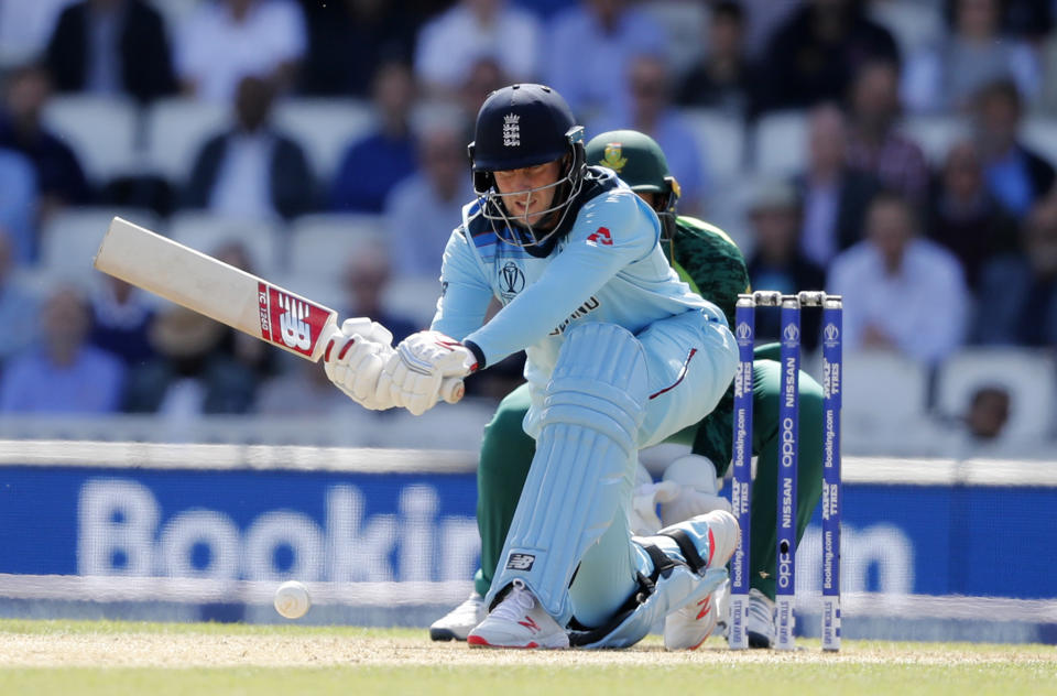 England's Joe Root plays a shot off the bowling of South Africa's Imran Tahir during their Cricket World Cup match at the Oval in London, Thursday, May 30, 2019. (AP Photo/Frank Augstein)