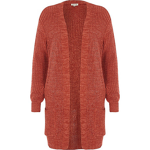 <p>When shopping for autumnal pieces, make sure to keep an eye out for pumpkin hues. We cannot wait to purchase this slouchy knit this season. <em><a rel="nofollow noopener" href="https://www.riverisland.com/p/petite-dark-pink-ribbed-knit-cardigan-701386" target="_blank" data-ylk="slk:River Island;elm:context_link;itc:0;sec:content-canvas" class="link ">River Island</a>, £36</em> </p>