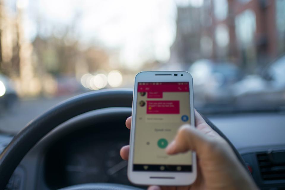 The Michigan House of Representatives passed three bills Tuesday that ban holding a cellphone or other electronic device while driving.