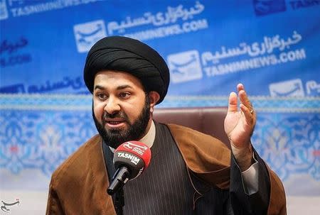 Murtada al-Sanadi, an exiled Bahraini Shi’ite cleric based in the Iranian holy city of Qom, speaks to Iranian media in Tehran, Iran, in this undated handout photo. Picture watermarked from source. Tasnim News Agency/Handout via REUTERS