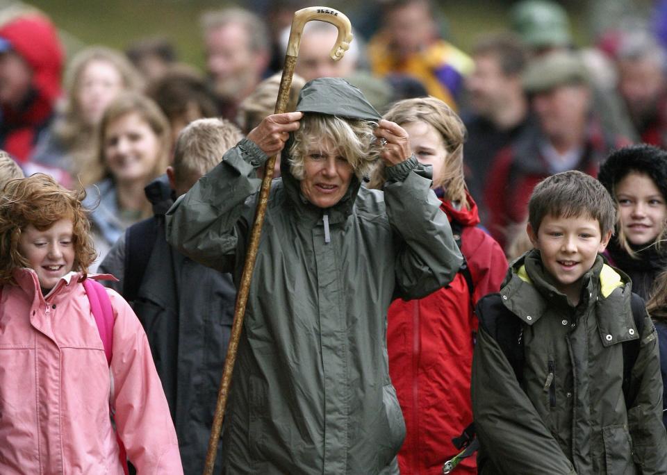 BALMORAL, UNITED KINGDOM - SEPTEMBER 20:  Camilla, Duchess of Cornwall, in her capacity as President of the National Osteoporosis Society participates in a ten-mile 'Big Bone Walk' around the Balmoral estate on September 20, 2006 in Balmoral, Scotland.  The event launches a series of 'Big Bone Walks' across the UK raising vital funds and encouraging better bone health in both children and adults.  (Photo by Jeff J Mitchell/Getty Images)