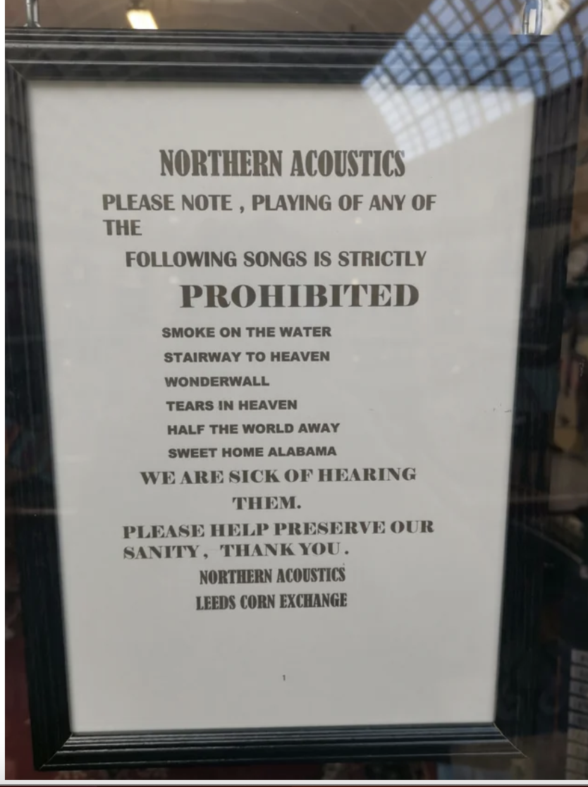 A list of prohibited songs from guitar store employees