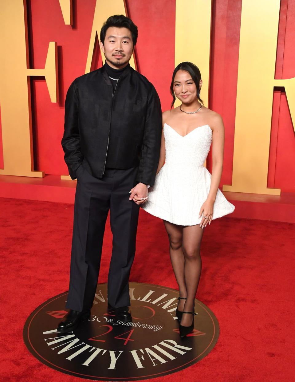 beverly hills, california march 10 simu liu, allison hsu arrives at the 2024 vanity fair oscar party hosted by radhika jones at wallis annenberg center for the performing arts on march 10, 2024 in beverly hills, california photo by steve granitzfilmmagic