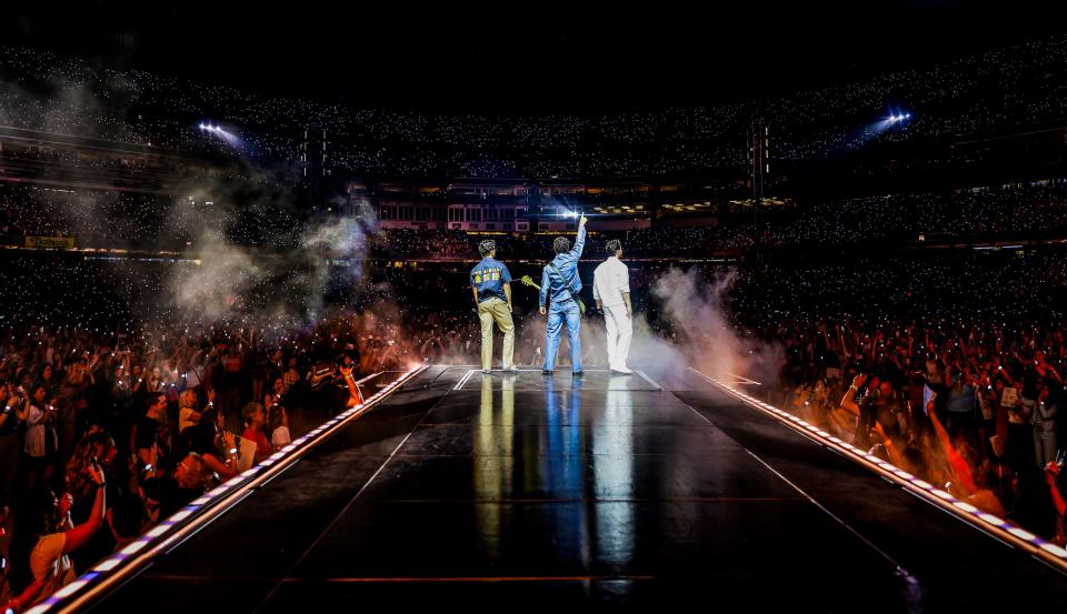The Jonas Brothers perform on stage during The Tour opening night at Yankee Stadium on Aug. 12, 2023, in New York City.