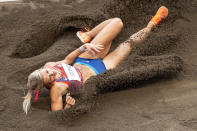 <p>Annie Kunz of the United States in action in the long jump event of the Heptathlon competition during the Track and Field competition at the Olympic Stadium at the Tokyo 2020 Summer Olympic Games on August 5, 2021 in Tokyo, Japan. (Photo by Tim Clayton/Corbis via Getty Images)</p> 