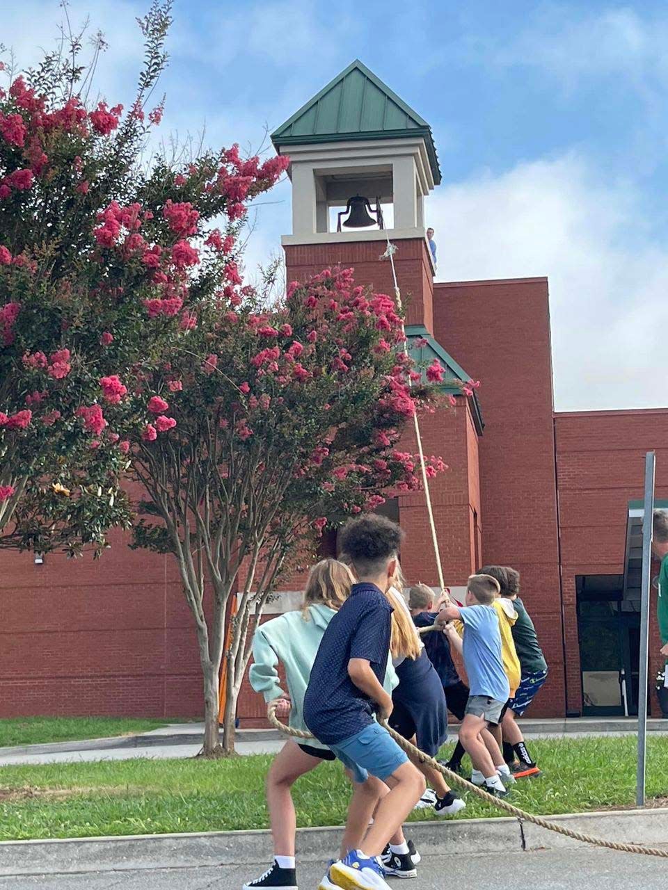 About 10 to 15 Hardin Valley Elementary fifth graders were given the honor of pulling the rope to ring the bell signifying the beginning of the school year Aug. 9, 2023.