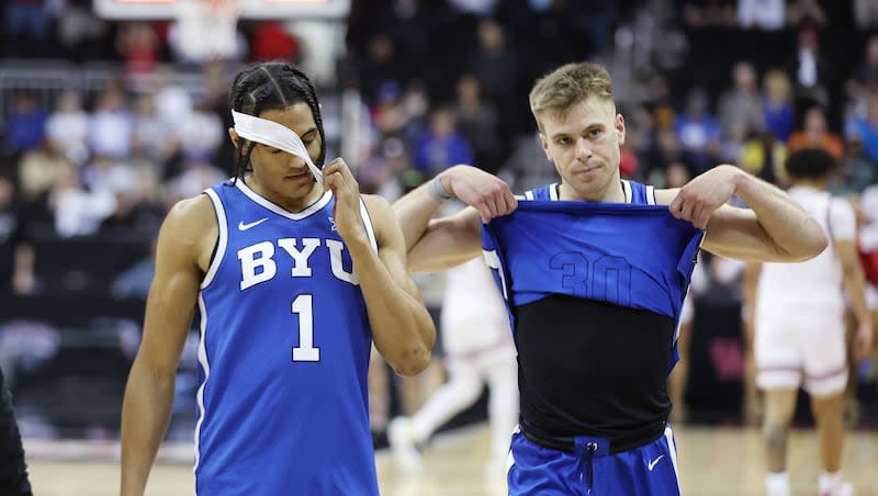 BYU guards Trey Stewart (1)  Dallin Hall exit the floor after the loss to Texas Tech during the Big 12 tournament quarterfinals in Kansas City, Mo., on Thursday, March 14, 2024. Texas Tech won, 81-67.