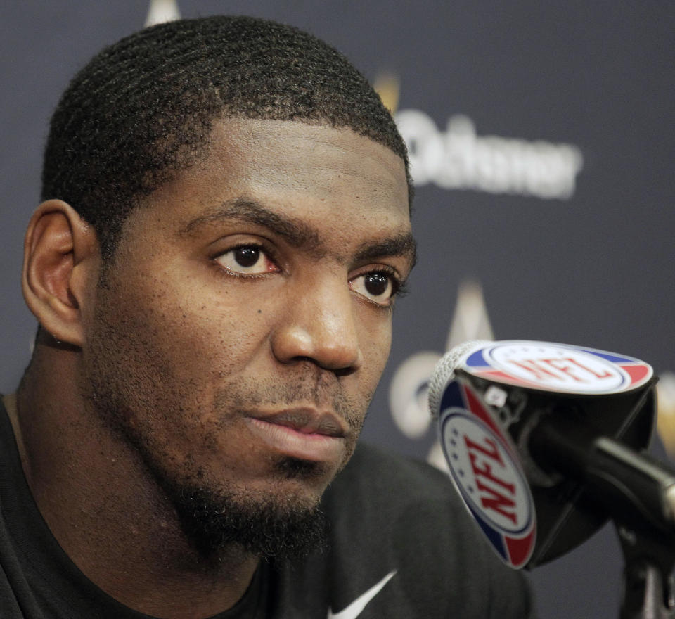 FILE - This July 28, 2011 file photo shows New Orleans Saints linebacker Jonathan Vilma answering questions during a news conference at the NFL football team's training facility, in Metairie, La. Vilma has been suspended without pay for the entire 2012 season by the NFL, one of four players punished for participating in a pay-for-pain bounty system. NFL Commissioner Roger Goodell's ruling was announced Wednesday, May 2, 2012 . (AP Photo/Bill Haber, File)