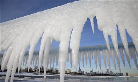 The Chicago skyline is framed by icicles in Chicago, Illinois, January 8, 2014. REUTERS/Jim Young