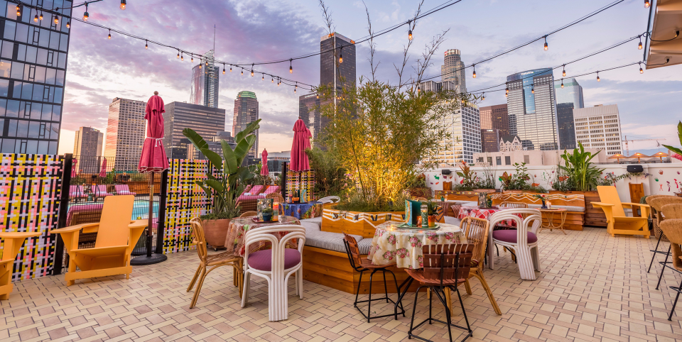 <p> When you think of traveling to LA, you probably picture all of the beach activities first (which, fair). But Downtown Los Angeles, aka DTLA, should definitely be on your radar, too—especially when it comes to the <a href="https://www.cosmopolitan.com/college/g37131017/top-college-bars/" rel="nofollow noopener" target="_blank" data-ylk="slk:nightlife" class="link ">nightlife</a>. Much like NYC, DTLA has different pockets that offer tons of unique restaurants and bars, all with various themes and vibes. The best part? Many of them have epic rooftop situations that give you stunning views of the city skyline, not to mention the iconic Hollywood Sign in the distance (well hellooo, photo ops). <br><br>We rounded up 12 of the area’s must-visit rooftop bars, from the eclectic to the super chill to the sleek and sophisticated. Read on for the most popular places to sit back, relax, and enjoy some great craft <a href="https://www.cosmopolitan.com/food-cocktails/a5631/fruity-cocktails-and-drinks/" rel="nofollow noopener" target="_blank" data-ylk="slk:cocktails" class="link ">cocktails</a>—plus a (low-key underrated) view of Los Angeles. And P.S. If you want to explore even more of LA the <em>Cosmo</em> way, may we suggest <a href="https://www.cosmotrips.com/trips-to/north-america/united-states?cities=west-hollywood_united-states" rel="nofollow noopener" target="_blank" data-ylk="slk:booking a trip with CosmoTrips" class="link ">booking a trip with CosmoTrips</a>, our new travel biz where we do all the planning for you and your crew, and you do absolutely zero work? We'll show you around town like a true VIP...trust. </p><p><a class="link " href="http://www.cosmotrips.com/trips-to/north-america/united-states?cities=west-hollywood_united-states" rel="nofollow noopener" target="_blank" data-ylk="slk:BOOK COSMOTRIPS">BOOK COSMOTRIPS</a></p>