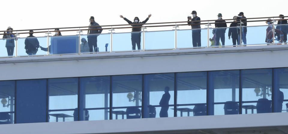 Passengers of the Diamond Princess, which is a cruise ship under coronavirus quarantine, seen on Wednesday.