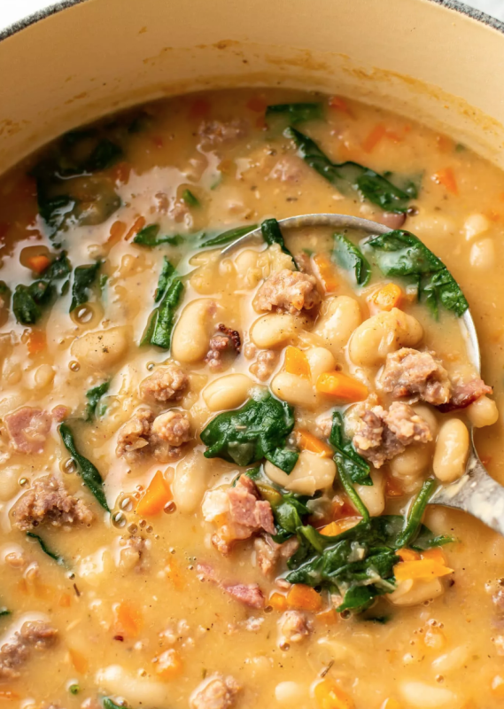 <p>Salt and Lavender</p><p>This flavorful Italian sausage white bean soup is loaded with bacon, plenty of tasty sausage pieces, spinach, and oodles of tender cannellini beans.</p><p><strong>Get the recipe: <a href="https://www.saltandlavender.com/italian-sausage-white-bean-soup/" rel="nofollow noopener" target="_blank" data-ylk="slk:Italian Sausage White Bean Soup;elm:context_link;itc:0;sec:content-canvas" class="link rapid-noclick-resp"><em>Italian Sausage White Bean Soup</em></a></strong></p>