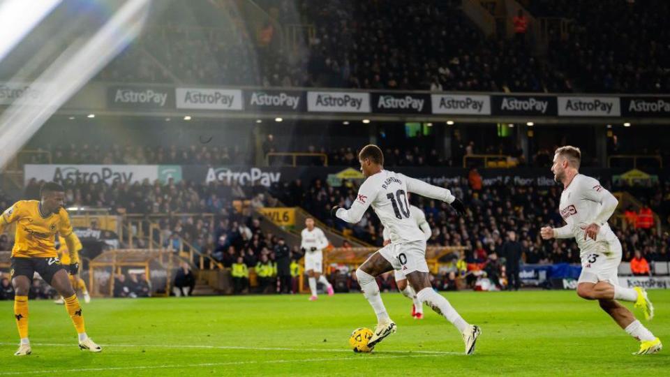 Wolves' Nelson Semedo up against Marcus Rashford and Luke shaw 