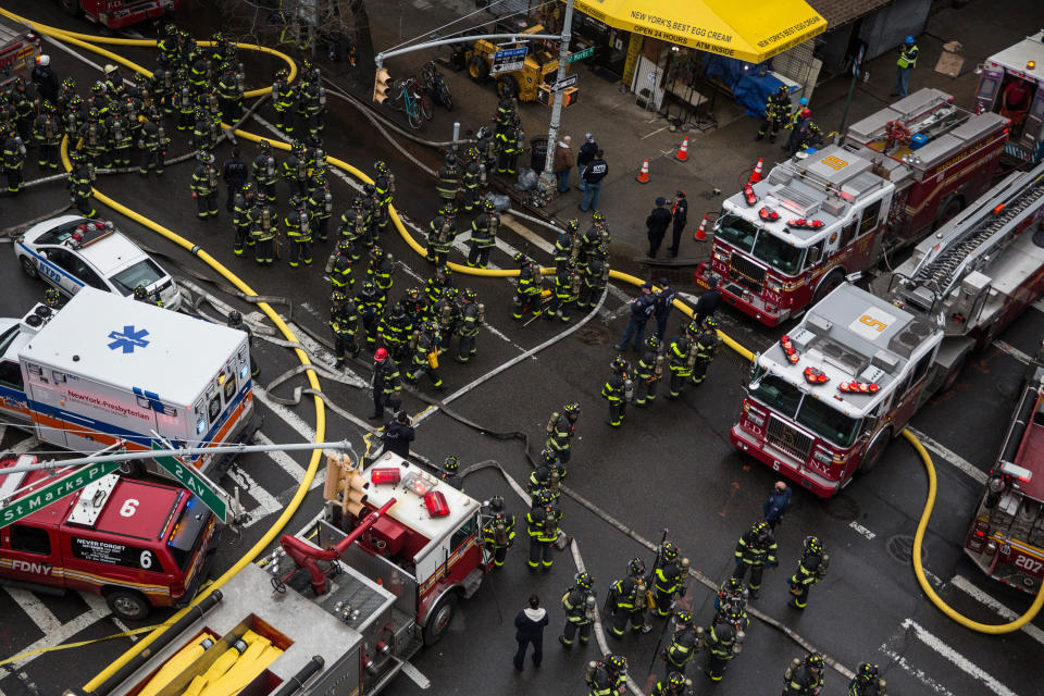 NEW YORK, NY - MARCH 26:  New York City Fire Department personel work to extinguish a fire as a building burns after an explosion on 2nd Avenue of Manhatten's East Village on March 26, 2015 in New York City. Officials have reported that at least 12 people were injured but it is unclear if anyone was trapped inside either building.  (Photo by Andrew Burton/Getty Images)