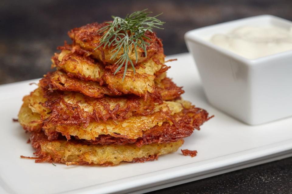 Latkes, Israel: Traditionally made for Hanukkah, latkes are potato pancakes that are fried in plenty of oil, then served with toppings such as sour cream or apple sauce. Much like potato chips, it’s pretty much impossible to eat just one latke, which is unfortunate since each tiny treat has about 5 grams of fat.