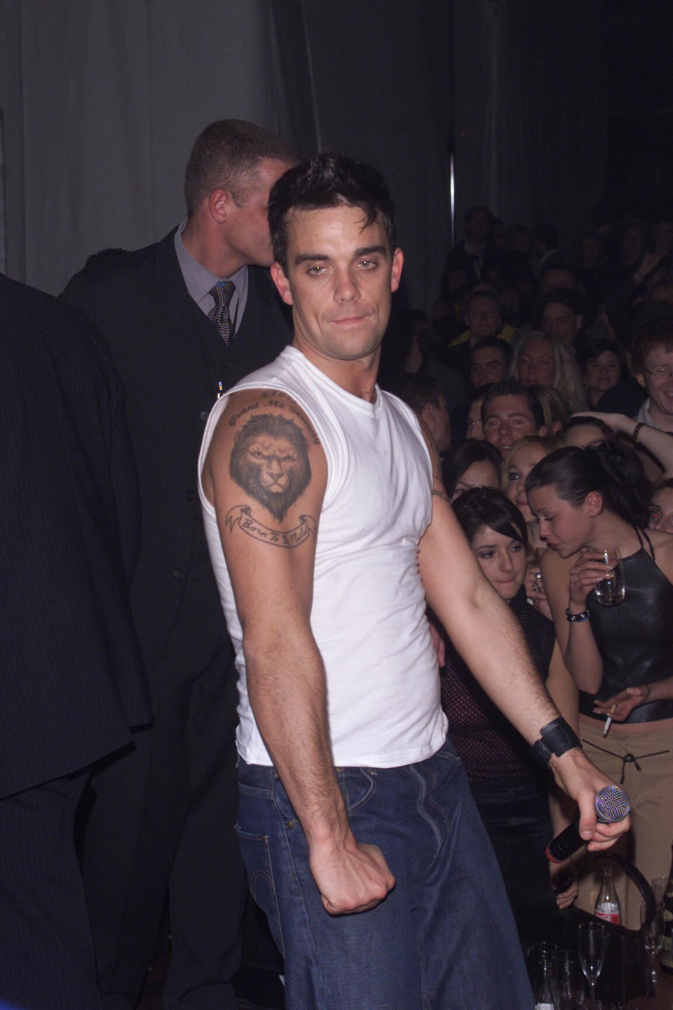 STOCKHOLM - NOVEMBER 16: British pop star Robbie Williams celebrates at the MTV after show party at the Grand Hotel on November 16, 2000 in Stockholm, Sweden. (Photo by Dave Hogan/Getty Images)