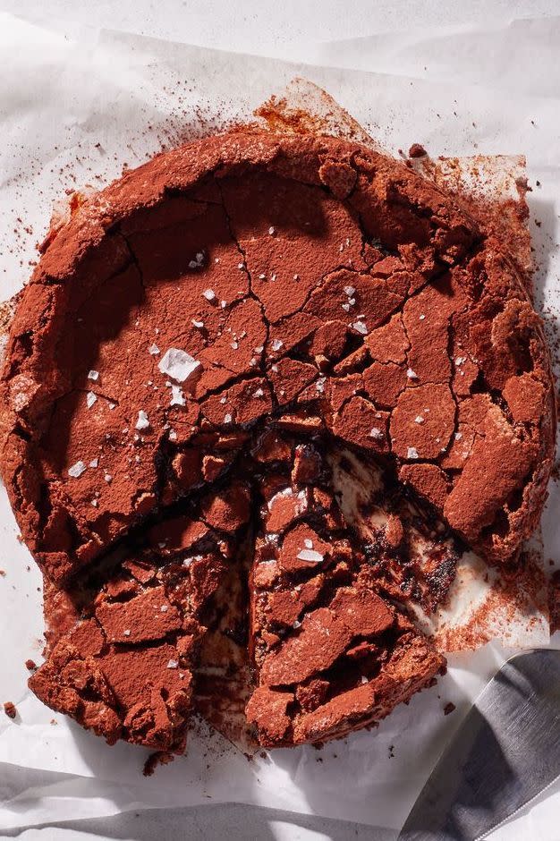 <p>Don't be surprised when you see cracks in the top of this <a href="https://www.delish.com/cooking/a27750610/homemade-chocolate-cake-recipe/" rel="nofollow noopener" target="_blank" data-ylk="slk:chocolate cake;elm:context_link;itc:0;sec:content-canvas" class="link ">chocolate cake</a>—this is normal with <a href="https://www.delish.com/cooking/recipe-ideas/a19473626/best-flourless-chocolate-cake-recipe/" rel="nofollow noopener" target="_blank" data-ylk="slk:flourless cakes;elm:context_link;itc:0;sec:content-canvas" class="link ">flourless cakes</a>, since steam causes the batter to expand while baking. When the temperature cools, it'll collapse back down, creating the signature cracks. Topped with a layer of cocoa powder, the result is gorgeously artistic.</p><p>Get the <strong><a href="https://www.delish.com/cooking/recipe-ideas/a39498963/flourless-chocolate-coconut-cake-recipe/" rel="nofollow noopener" target="_blank" data-ylk="slk:Flourless Chocolate Coconut Cake recipe;elm:context_link;itc:0;sec:content-canvas" class="link ">Flourless Chocolate Coconut Cake recipe</a></strong>.</p>