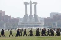 Soldiers walk in front of the Monument to the Foundation of the Workers' Party in Pyongyang, North Korea April 16, 2017. REUTERS/Damir Sagolj